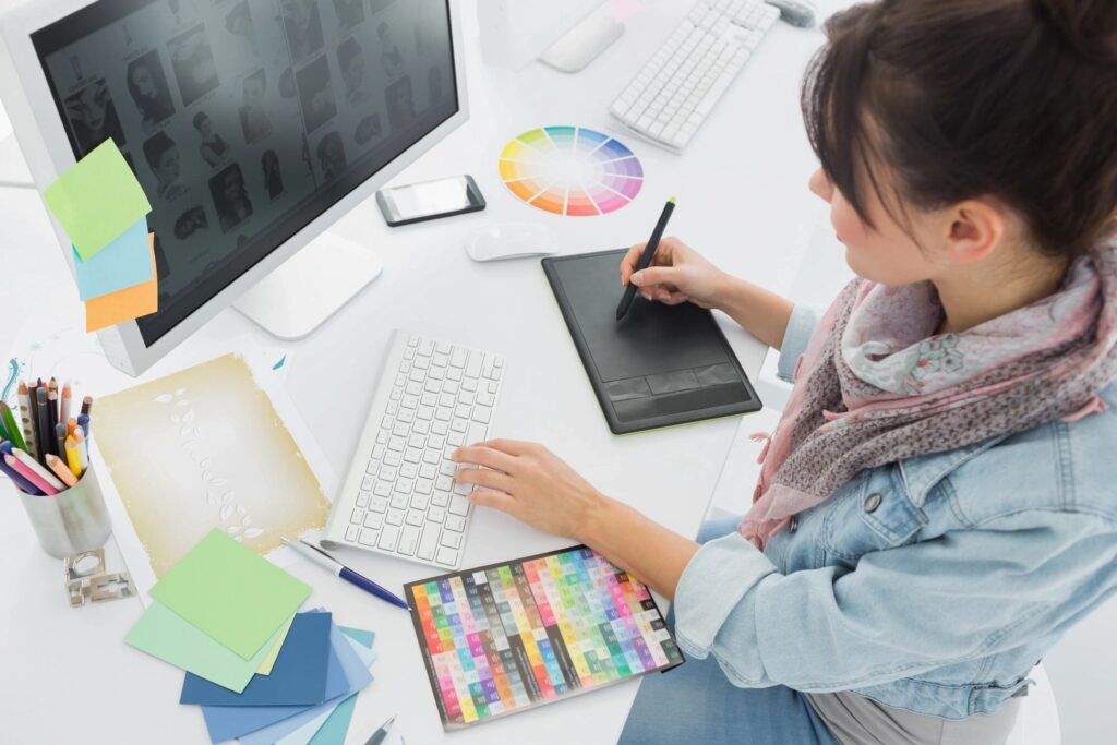 Graphic designer creating custom designs for you and your small business